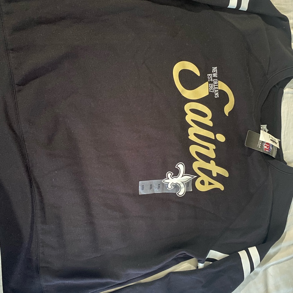 New Orleans Saints sweater top.